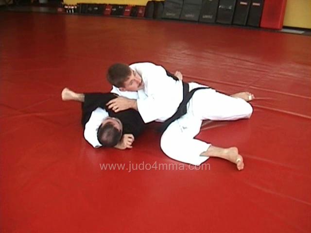 Click for a video showing how to transition from Kesa Gatame to Kata Gatame - Scarf Hold to Should Lock/Hold